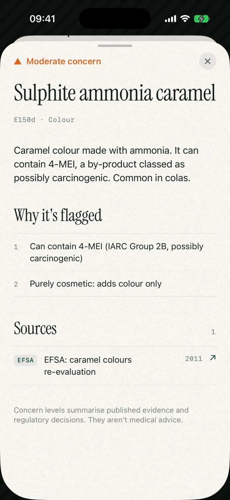 The page for sulphite ammonia caramel (E150d): moderate concern, why it is flagged, and its EFSA source from 2011.